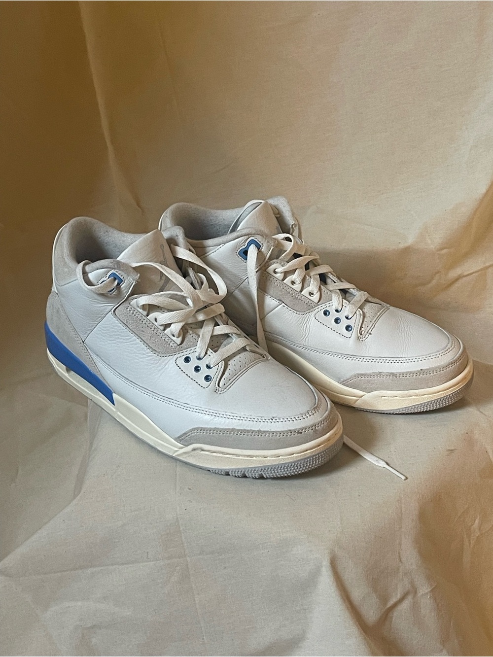 Jordan North Carolina Blue and White Sneakers .